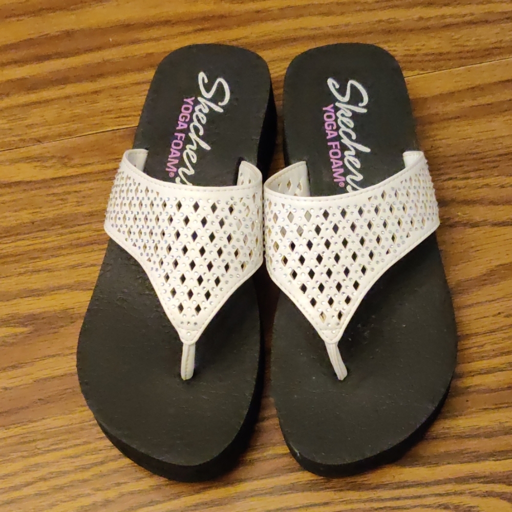 White Skechers yoga foam